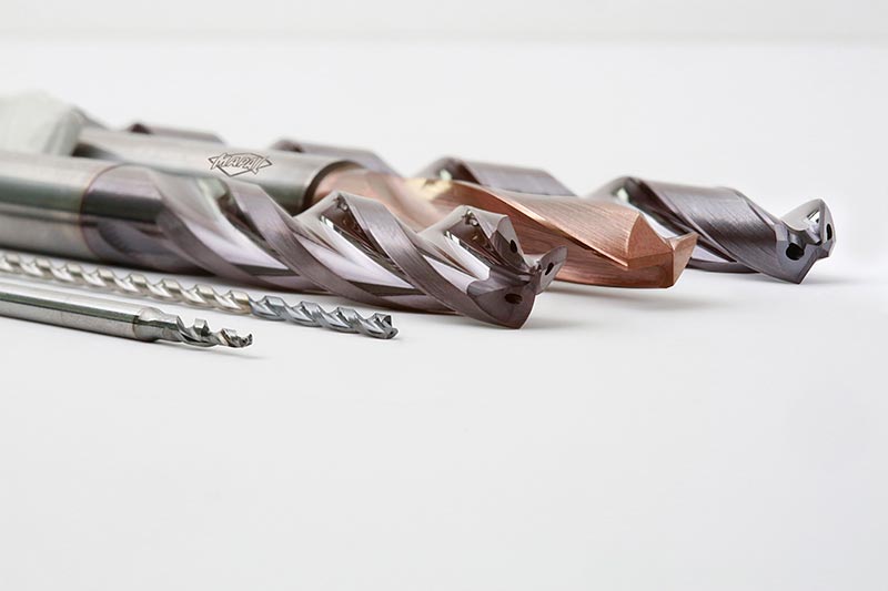 5 horizontal drills: MEGA-Pilot-Drill, MEGA-Deep-Drill, Tritan-Drill-Steel, MEGA-Drill-Hardened and MEGA-Speed-Drill-Inox.