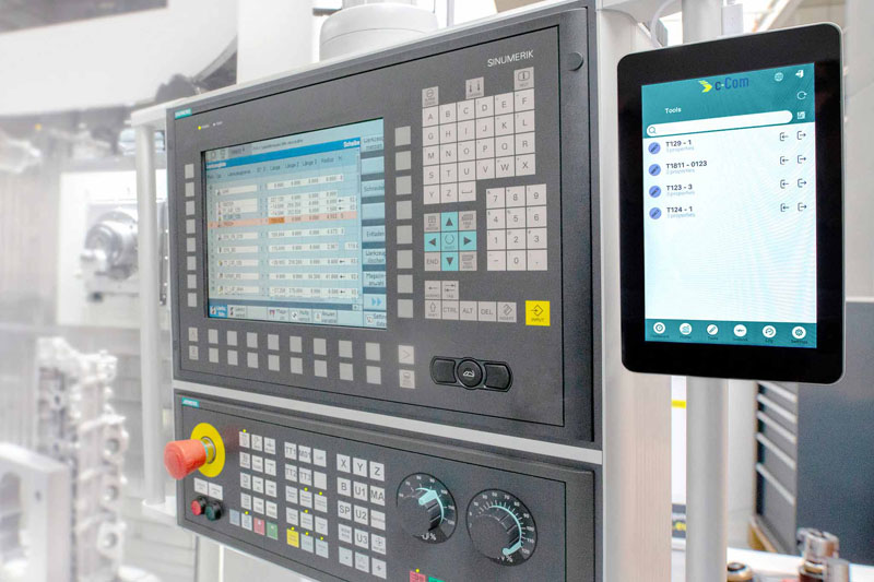 In the right-hand third of the image, the c-Connect box, which is connected to the press controls in the centre of the image, is shown.