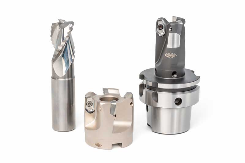 The picture shows three different milling cutters for high-volume machining of aluminium.