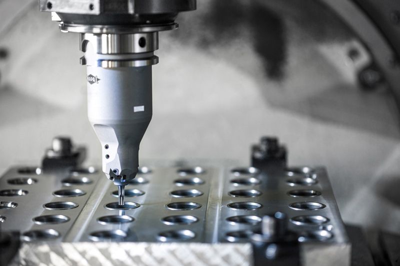 The image shows a combination tool for valve seat and valve guide machining featuring the HNHX insert introduced in 2023.