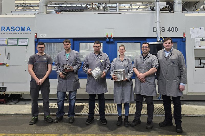 The image shows the development team of LTH Castings