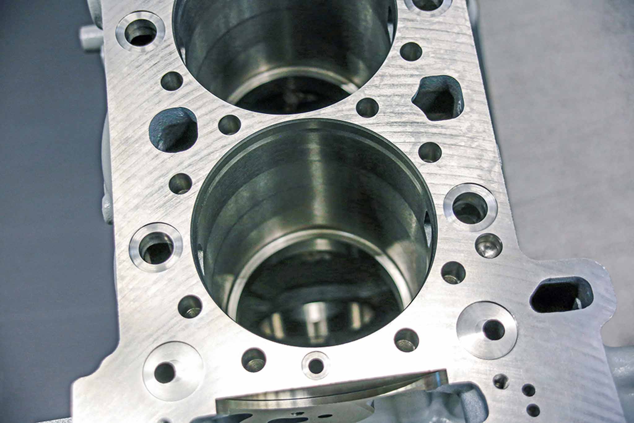 Section of a lorry engine block. From the top, you can see the cylinder liner connections.